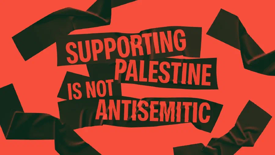 Black tape on a red background with overlaid text: Supporting Palestine is not antisemitic.